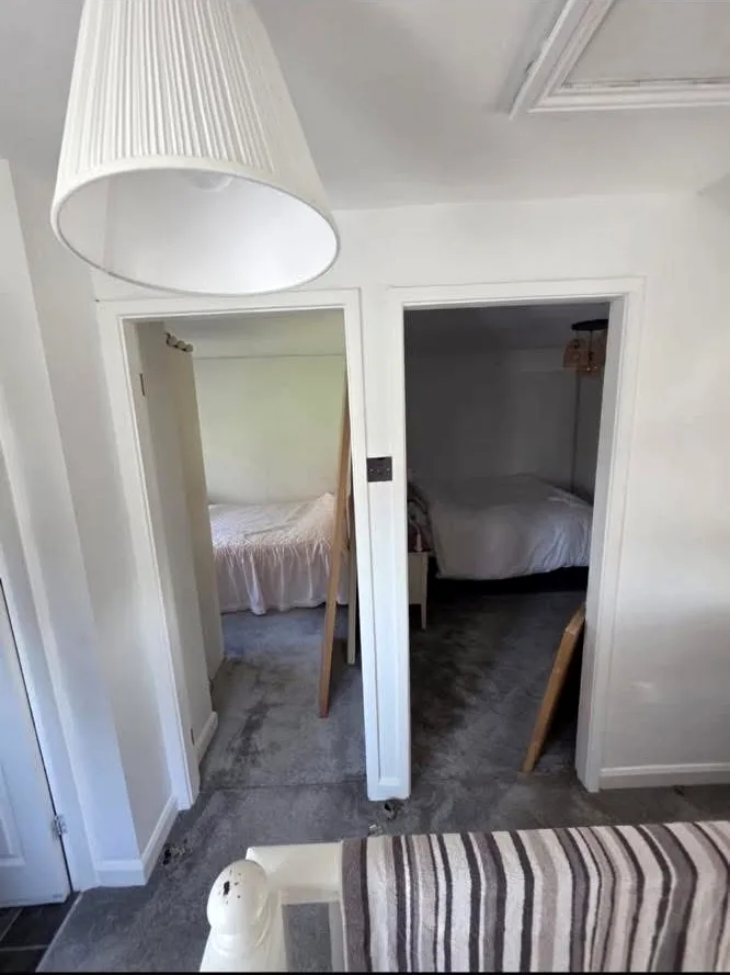 Two open internal doorways before the paired oak doors were fitted