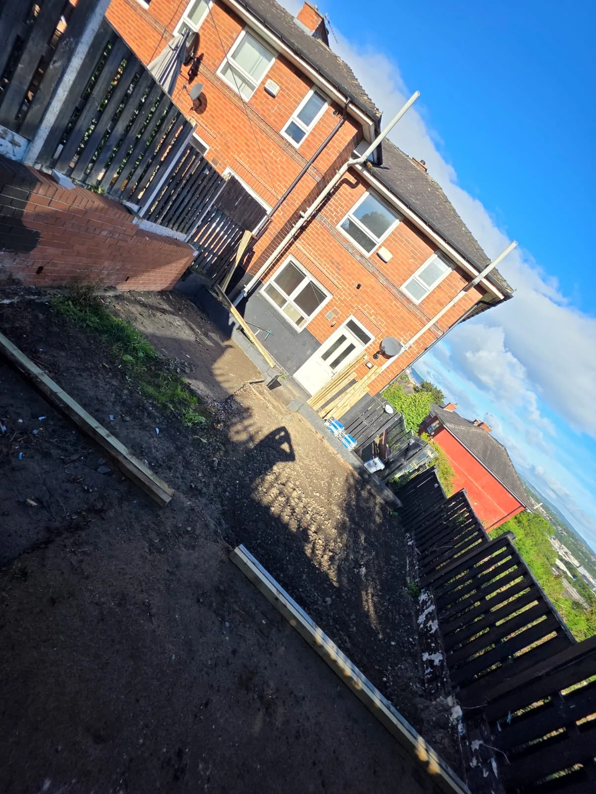 Garden levels prepared before the timber fence sections were installed