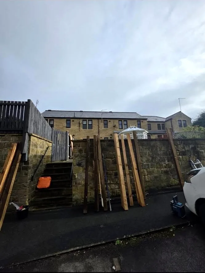 Timber posts and boards during the fencing installation