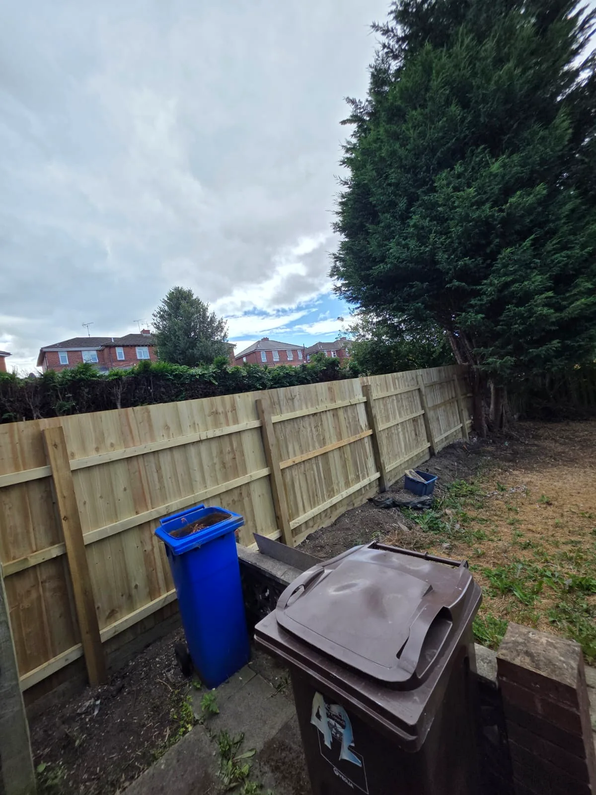 Completed timber boundary fence viewed from the garden