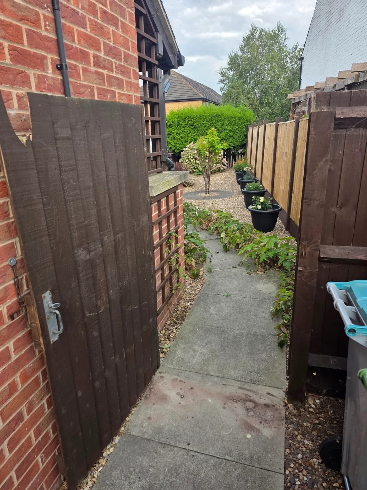 Side garden access opening before the new timber gate was fitted
