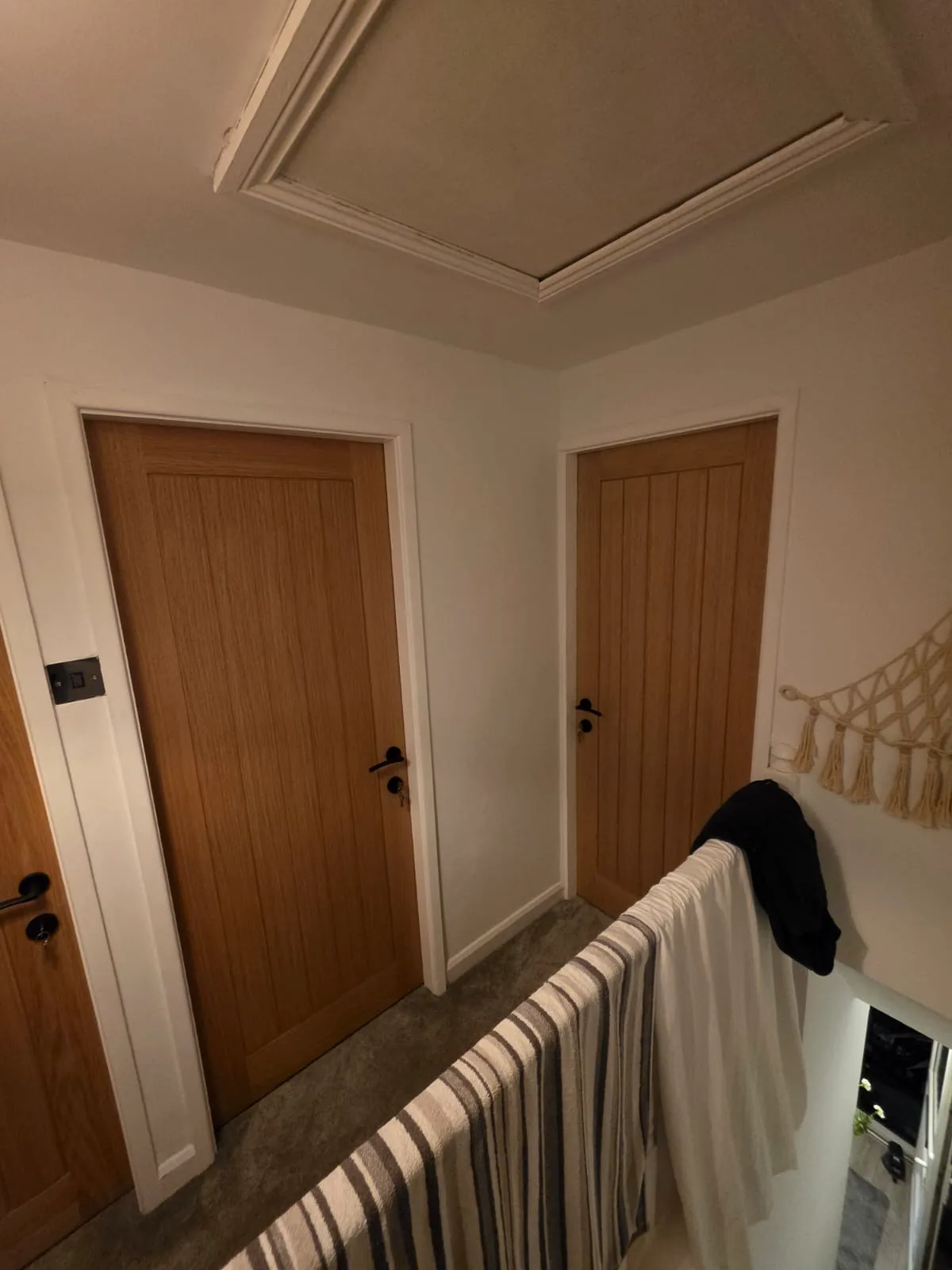 Completed natural timber internal doors around the landing