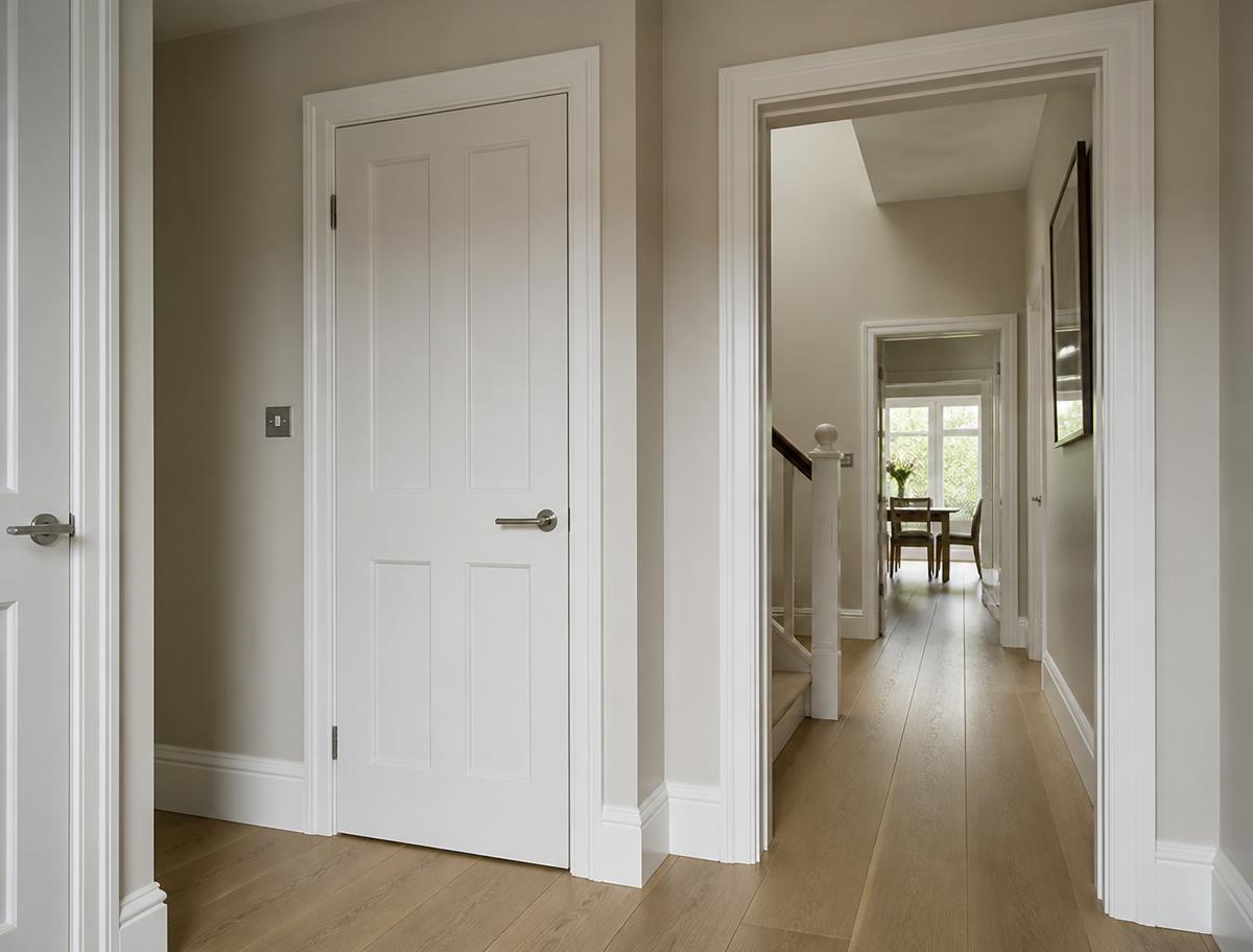 Newly finished hallway with fresh skirting, architrave and painted door